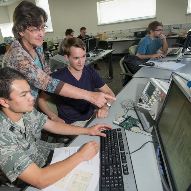 students working on a computer