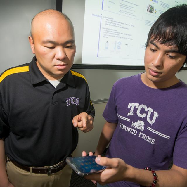 students looking at a phone