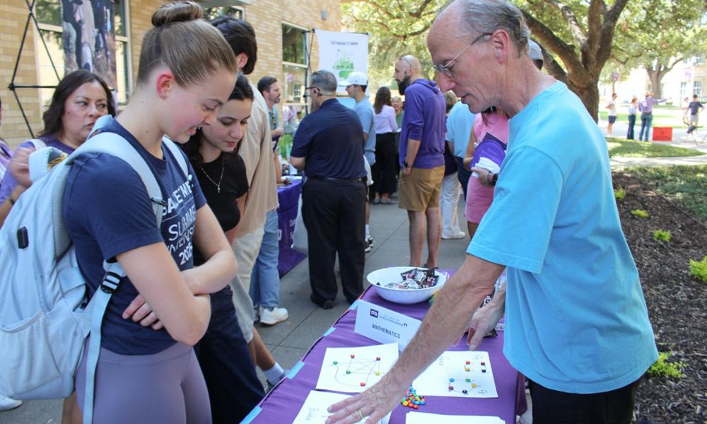 students interacting with Math Dept professor