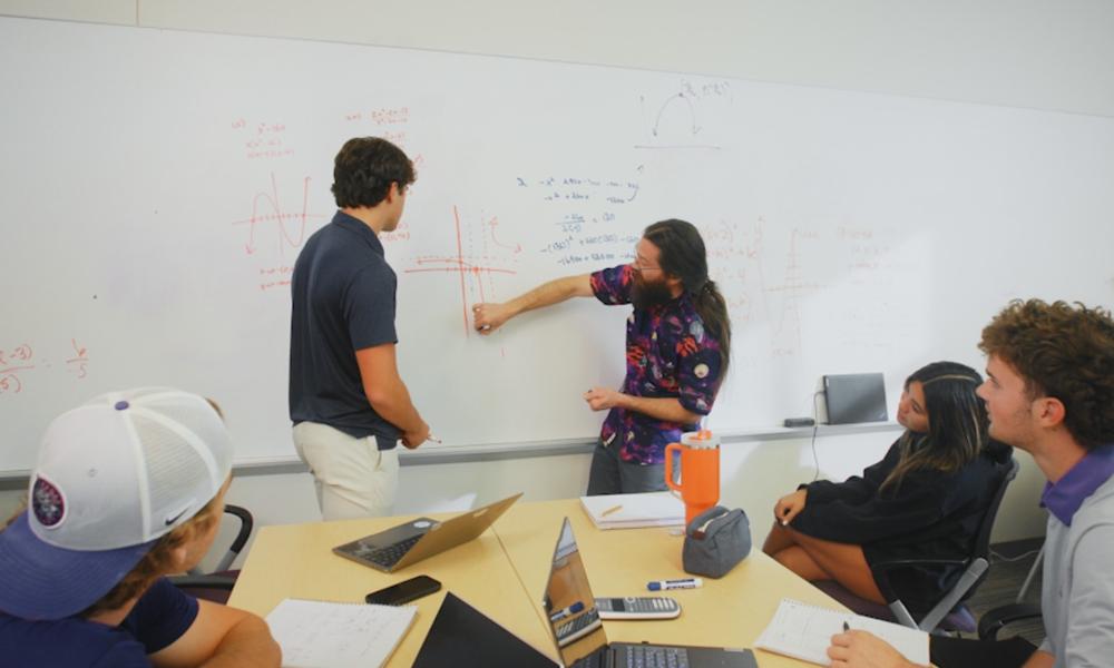 student working on a globe
