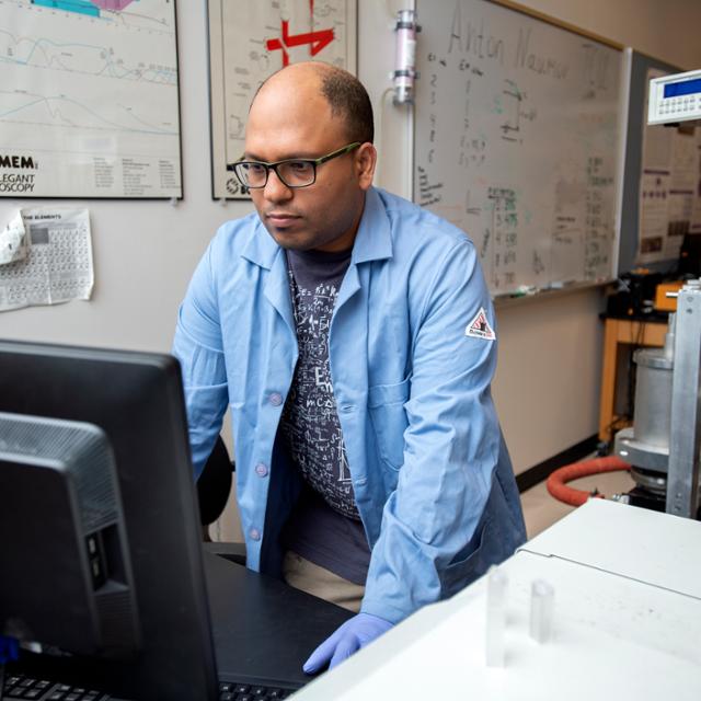 student working on a computer