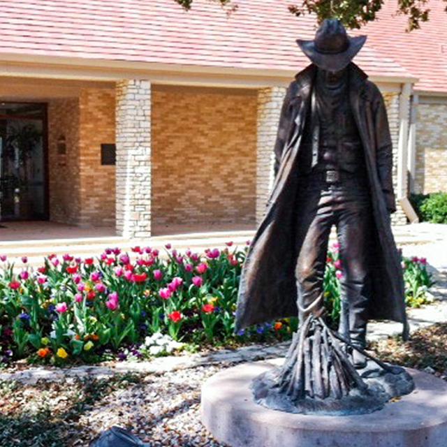 Tulips at the ranch management statue